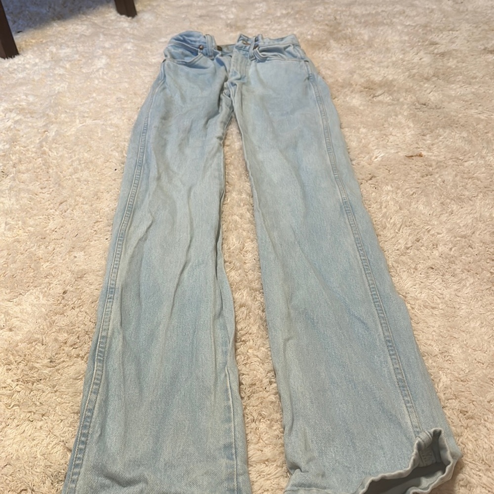 Light wash slim boot cut wranglers
